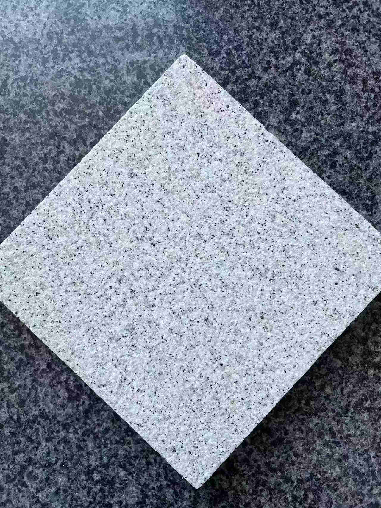 25厚白麻石材